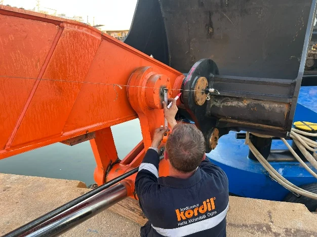 Kordil technician installing an excavator positioning sensor